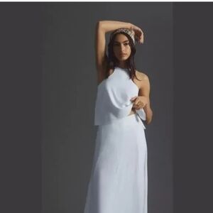 White asymmetrical vest